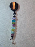BH8 Purple, Turquoise, Green Badge Holder (Black Holder)