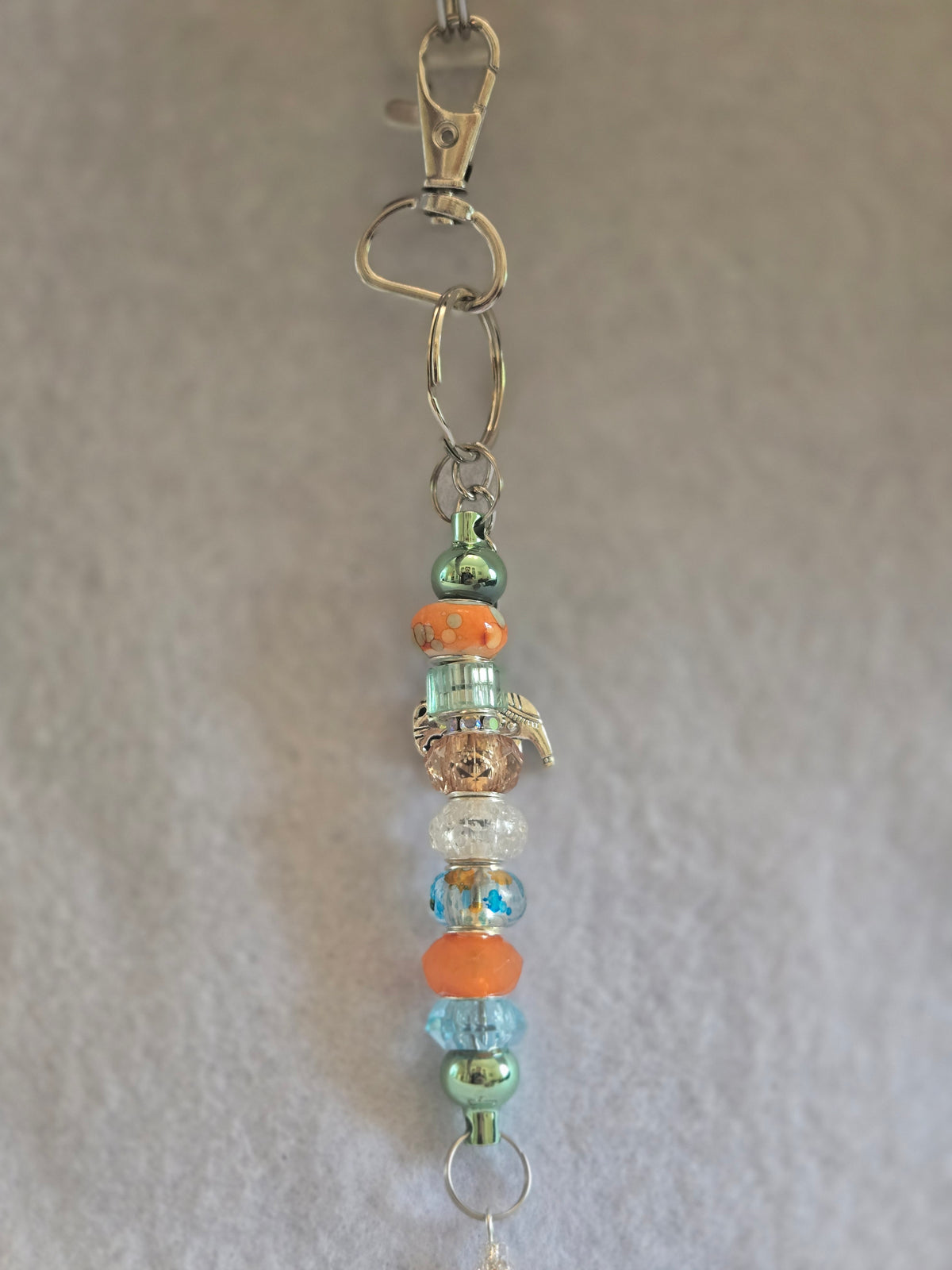 S2-10 Turquoise and Orange Beaded Keychain