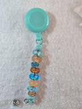 BH4 Brown and Teal Badge Holder