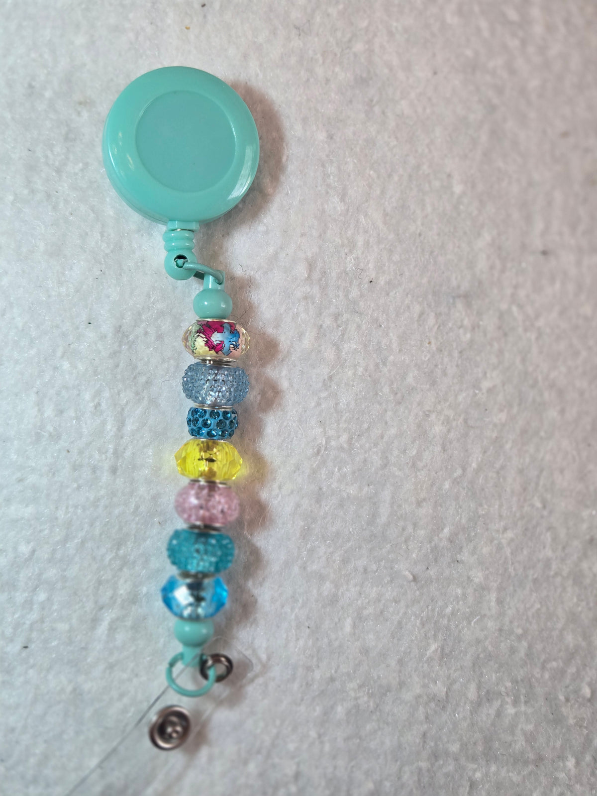 BH7 Turquoise, Yellow, and Pink Badge Holder (Turquoise Holder)