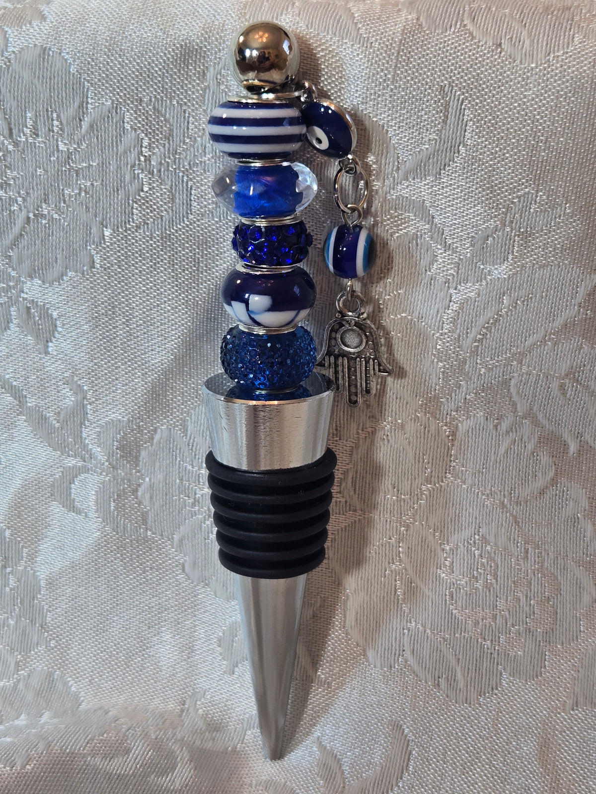 W7 Blue and white wine bottle stopper with eye and hamsa