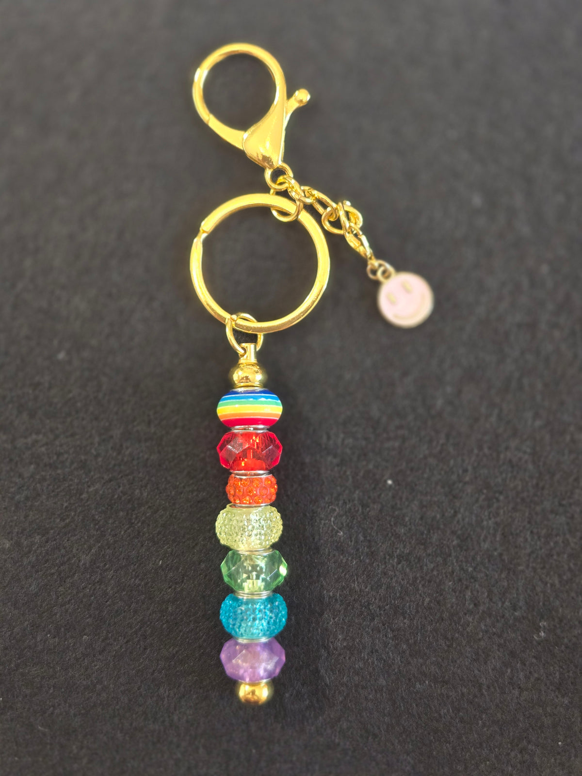 GL6 Rainbow Beaded Keychain with smiley face