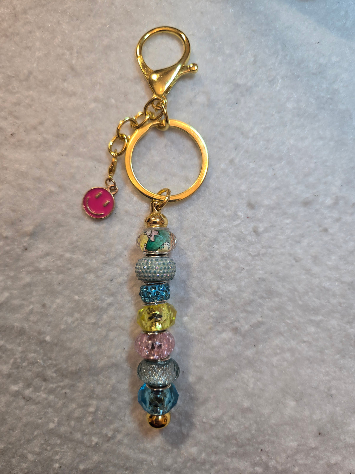 GL10 Pink, Turquoise, Yellow Beaded Keychain with smiley face