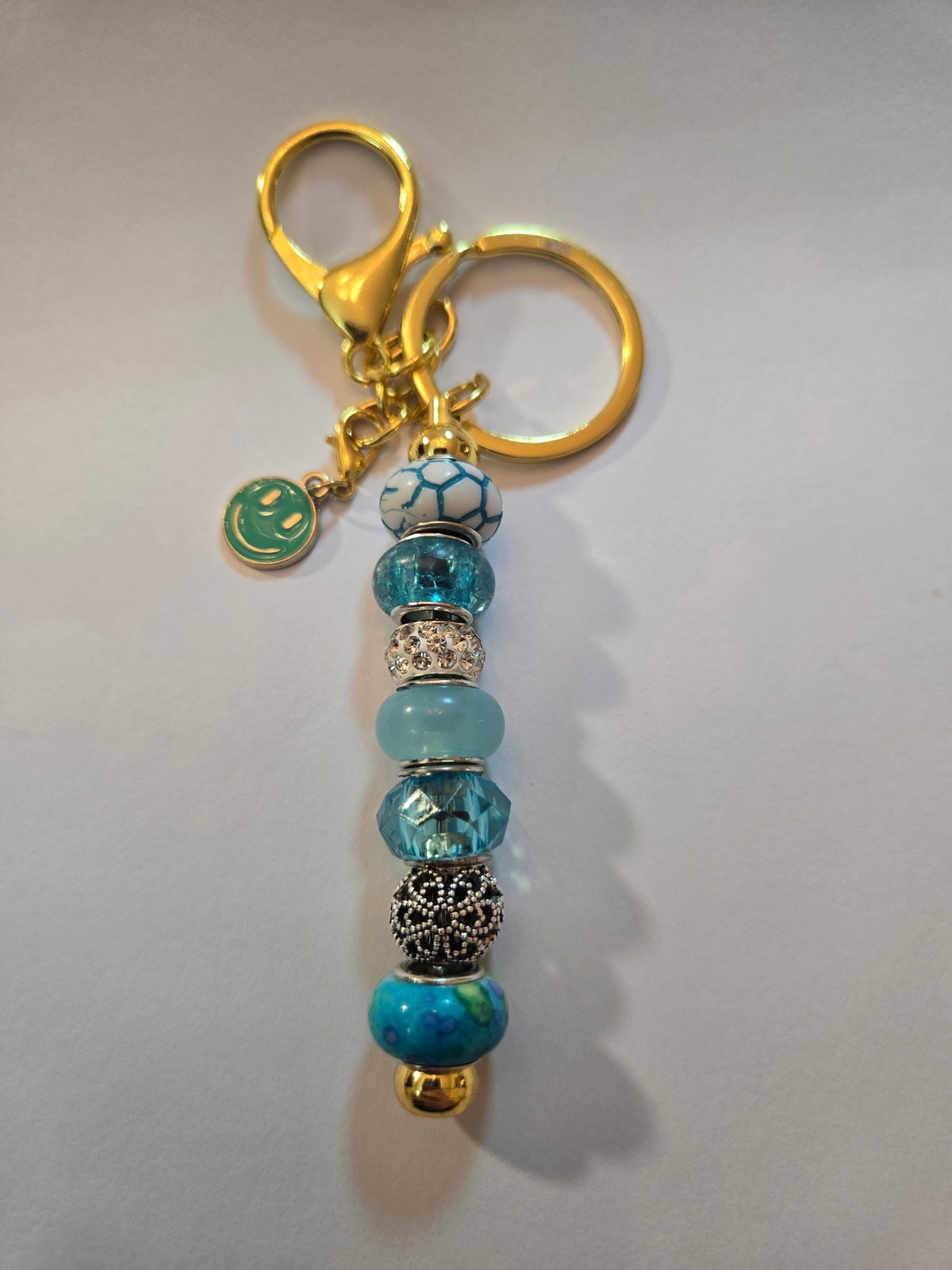 GL15 Teal and Silver Beaded Keychain with smiley face